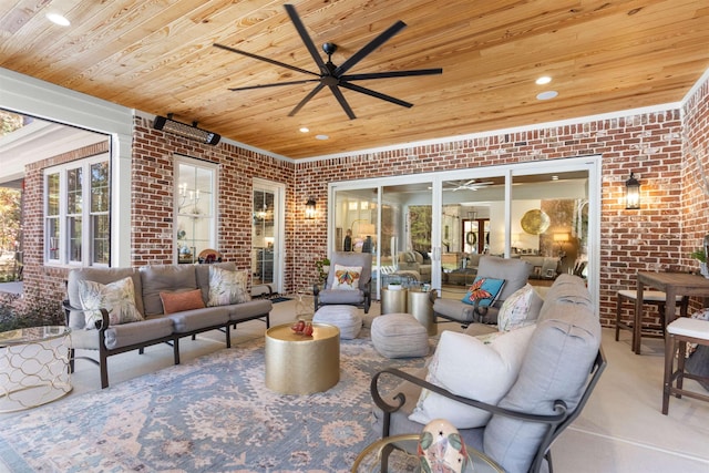 view of patio / terrace with an outdoor living space and ceiling fan