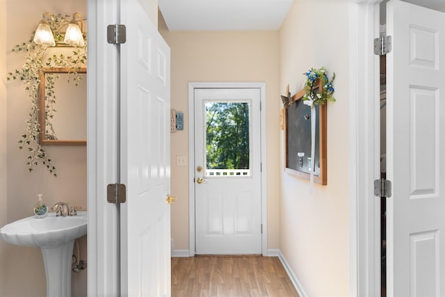 entryway with light wood-type flooring