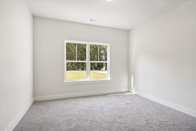 unfurnished room featuring carpet floors