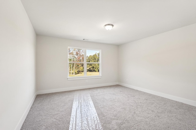 spare room with carpet flooring