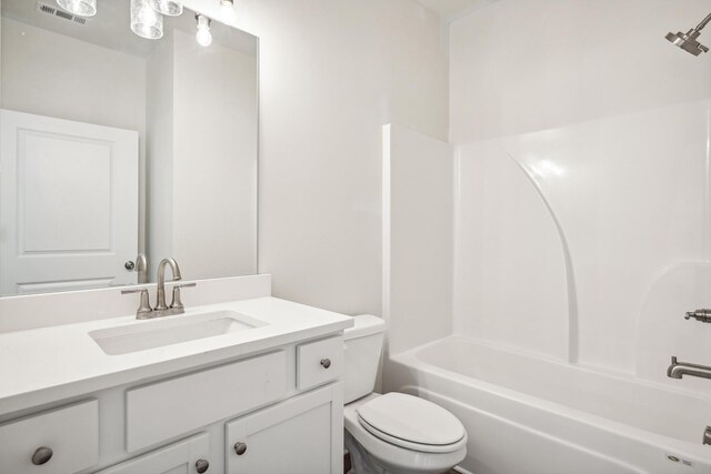 full bathroom featuring vanity, shower / bathtub combination, and toilet