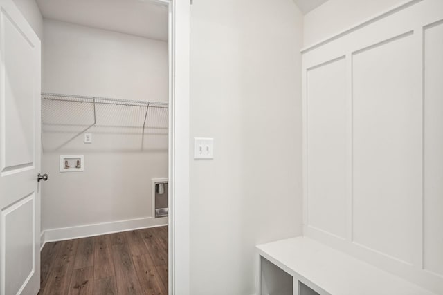 washroom featuring washer hookup and dark hardwood / wood-style flooring