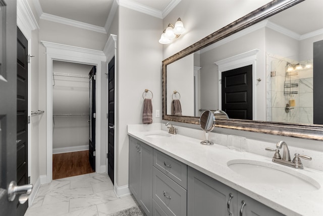 bathroom with crown molding, a shower, and vanity