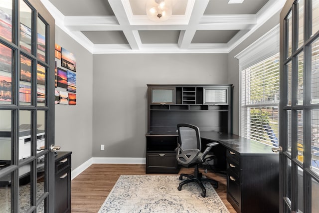 office space featuring coffered ceiling, hardwood / wood-style floors, beam ceiling, and crown molding