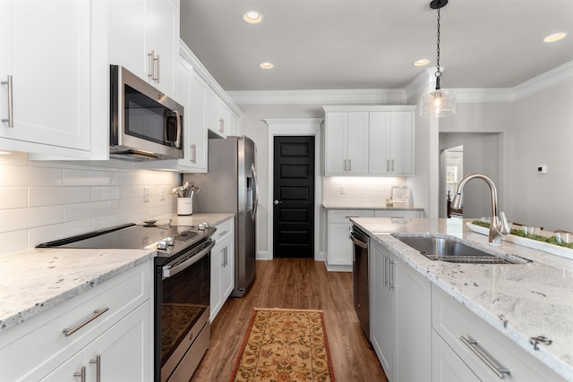 kitchen featuring white cabinets and appliances with stainless steel finishes