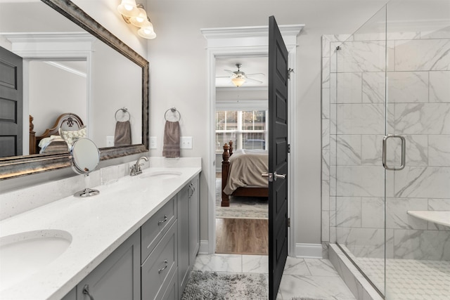 bathroom with vanity and an enclosed shower