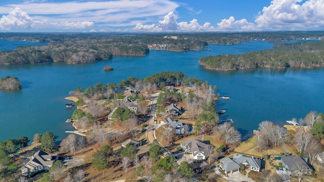 birds eye view of property featuring a water view and a residential view