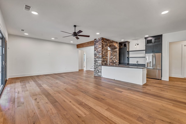 unfurnished living room featuring recessed lighting, ceiling fan, visible vents, and light wood-style floors