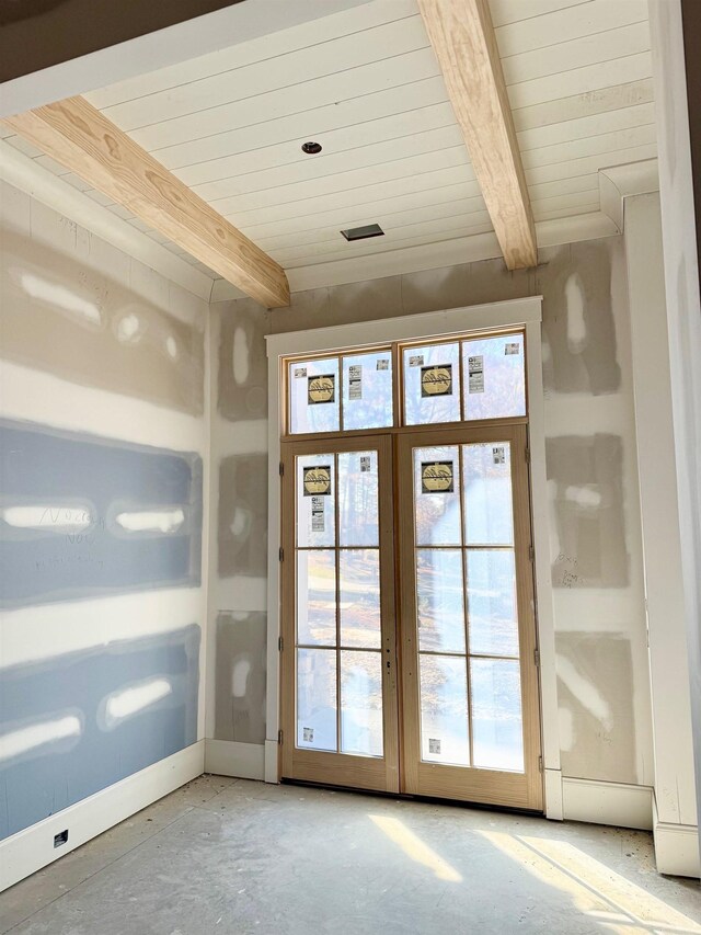 entryway with beam ceiling