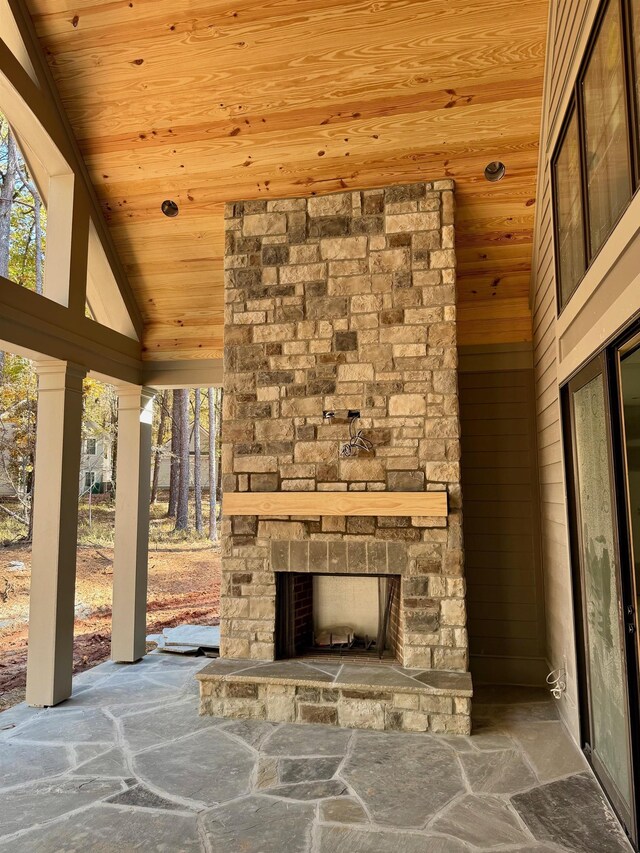 view of patio / terrace with an outdoor stone fireplace