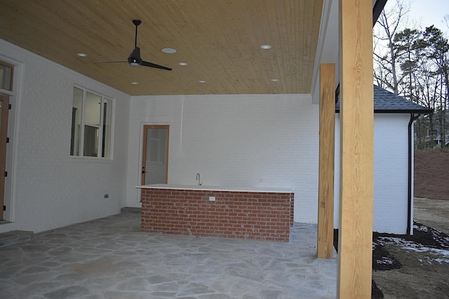 view of patio with ceiling fan