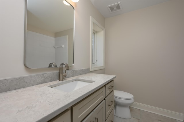 bathroom featuring tile patterned floors, visible vents, toilet, baseboards, and vanity