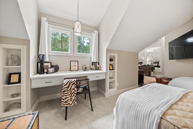1011 Cartwright Ln, Greensboro, GA 30642 - bedroom with built in desk, light colored carpet, and lofted ceiling