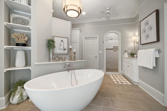 1011 Cartwright Ln, Greensboro, GA 30642 - bathroom with a ceiling fan, a stall shower, vanity, a freestanding tub, and tile patterned floors