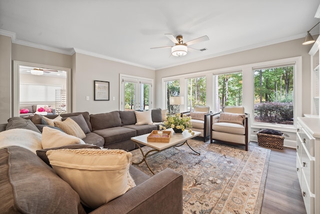 1011 Cartwright Ln, Greensboro, GA 30642 - living area with ceiling fan, wood finished floors, and ornamental molding