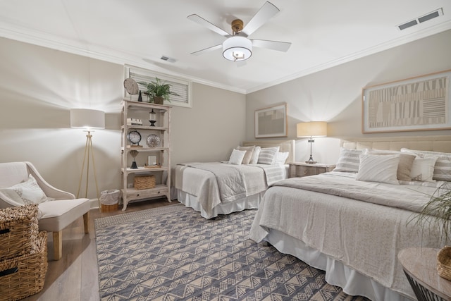 1011 Cartwright Ln, Greensboro, GA 30642 - bedroom featuring crown molding, dark wood finished floors, and ceiling fan