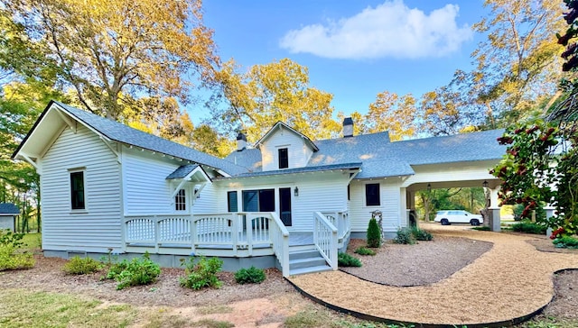 view of front of house with a wooden deck