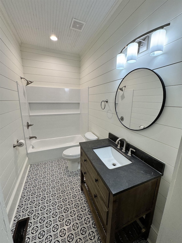 full bathroom with wood walls, shower / bath combination, vanity, tile patterned flooring, and toilet