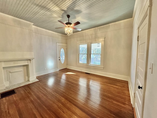 unfurnished living room featuring ceiling fan, hardwood / wood-style floors, a high end fireplace, ornamental molding, and wooden ceiling