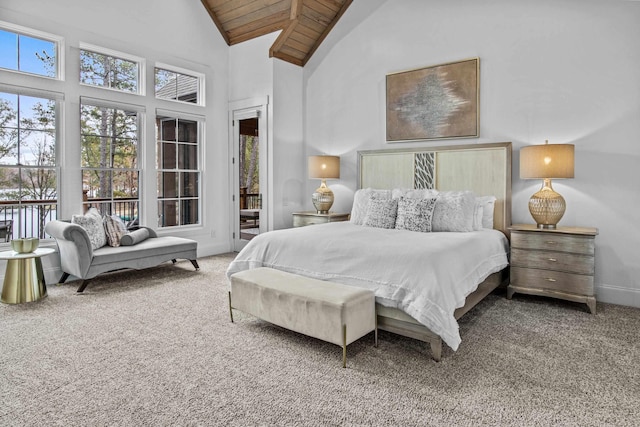 1031 Fish Trap Shls, Greensboro, GA 30642 - carpeted bedroom with wooden ceiling, high vaulted ceiling, baseboards, and access to exterior