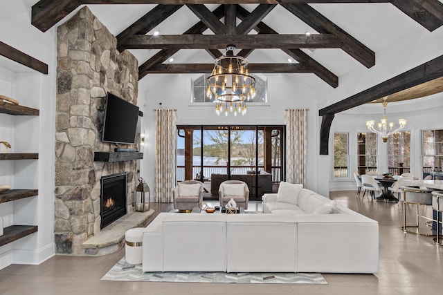 1031 Fish Trap Shls, Greensboro, GA 30642 - living room featuring a chandelier, beamed ceiling, high vaulted ceiling, a fireplace, and built in features