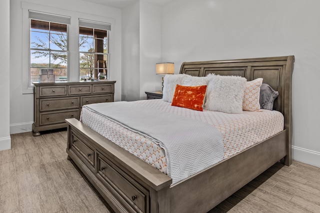 1031 Fish Trap Shls, Greensboro, GA 30642 - bedroom featuring baseboards and light wood-style floors