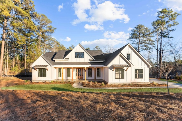 modern farmhouse style home with covered porch