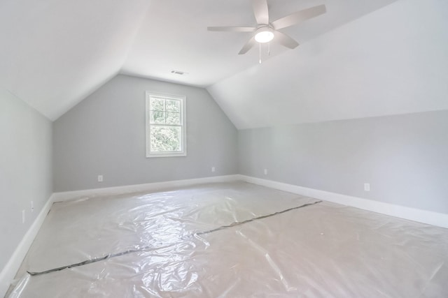 additional living space with lofted ceiling and ceiling fan