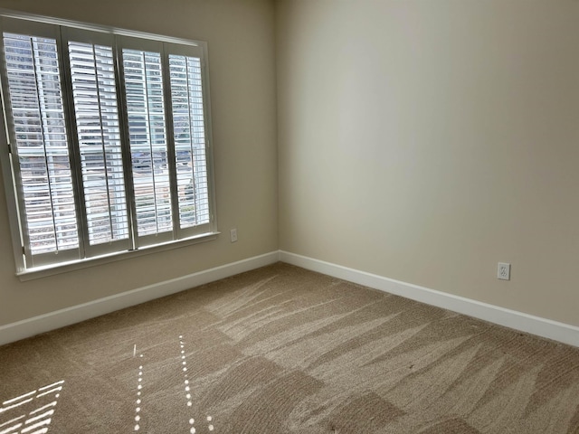 view of carpeted spare room