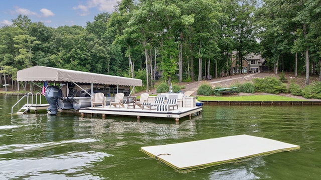146 Long Island Dr, Eatonton, GA 31024 - dock featuring a water view and boat lift