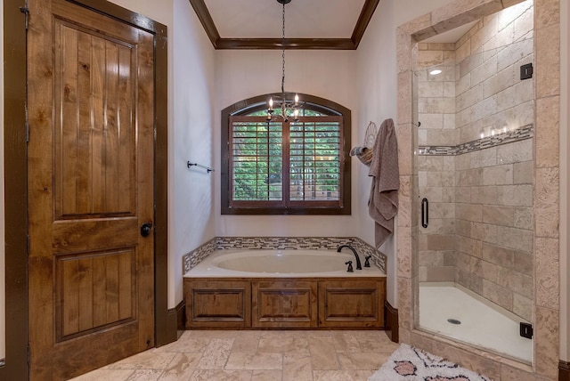146 Long Island Dr, Eatonton, GA 31024 - full bath featuring a chandelier, ornamental molding, a bath, and a stall shower