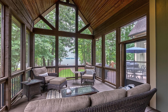 146 Long Island Dr, Eatonton, GA 31024 - sunroom / solarium with an outdoor living space, vaulted ceiling, a water view, and plenty of natural light