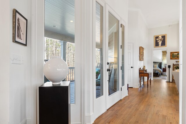 entryway with light hardwood / wood-style floors