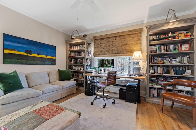 office area with ceiling fan, ornamental molding, and wood-type flooring