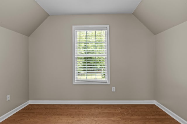 163 Knight Dr, Milledgeville, GA 31061 - bonus room featuring lofted ceiling, wood finished floors, and baseboards