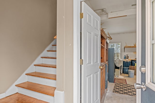 stairs with concrete floors