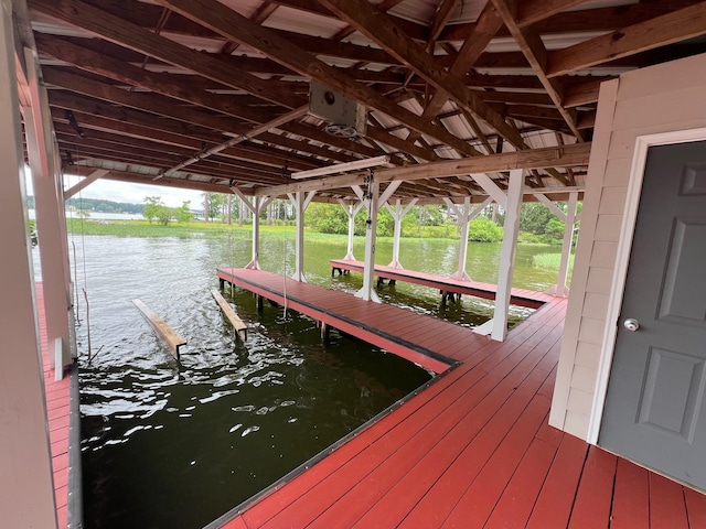 163 Knight Dr, Milledgeville, GA 31061 - dock featuring boat lift and a water view