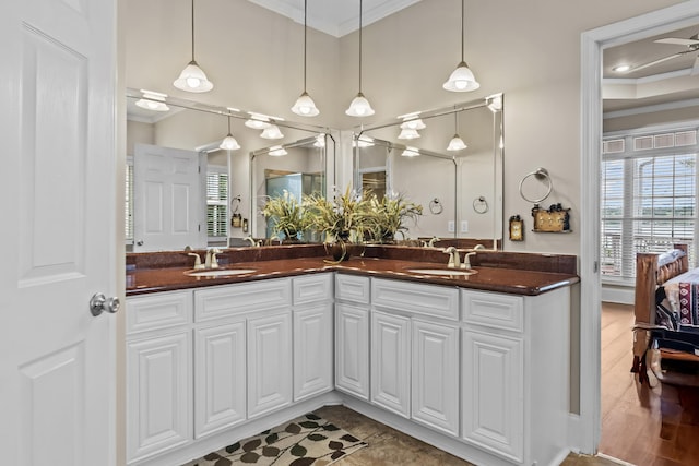 163 Knight Dr, Milledgeville, GA 31061 - bathroom with ornamental molding, double vanity, healthy amount of natural light, and a ceiling fan