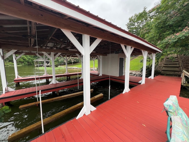 163 Knight Dr, Milledgeville, GA 31061 - dock area featuring boat lift and a water view