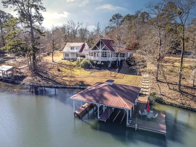 163 Knight Dr, Milledgeville, GA 31061 - dock area featuring boat lift and a water view