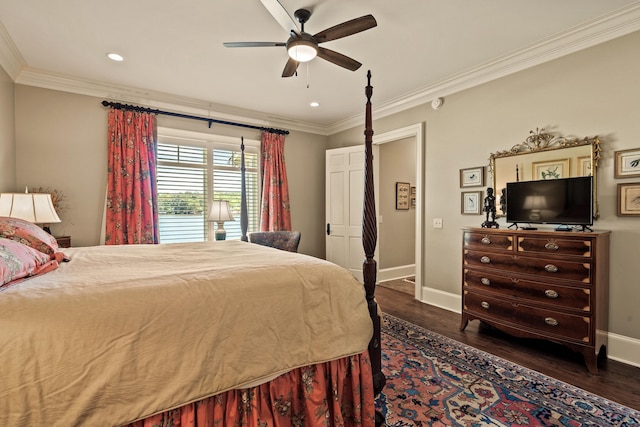 bedroom with ceiling fan, ornamental molding, and dark hardwood / wood-style flooring