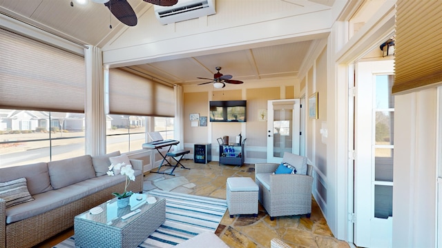 sunroom featuring ceiling fan and an AC wall unit