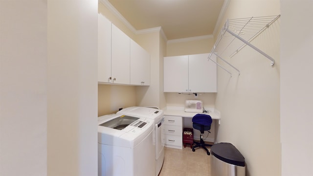 laundry room with cabinets, ornamental molding, washer and dryer, and light tile patterned floors