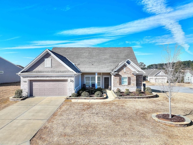 ranch-style house featuring a garage