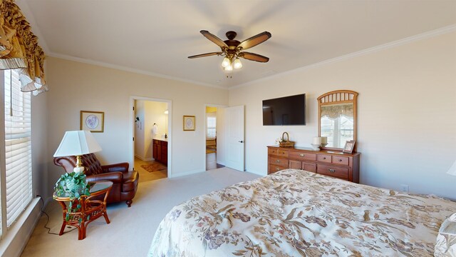 carpeted bedroom featuring connected bathroom, ornamental molding, and ceiling fan