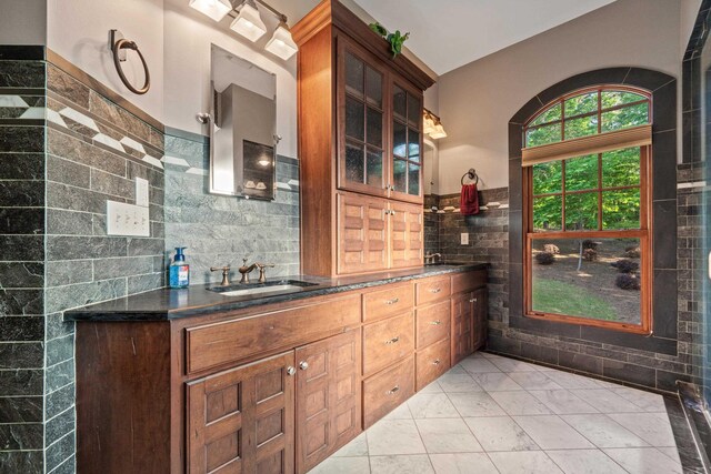 1611 Pine Grove Rd, Greensboro, GA 30642 - kitchen featuring tile walls and sink