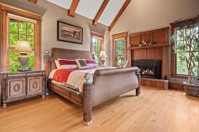1611 Pine Grove Rd, Greensboro, GA 30642 - bedroom with beam ceiling, multiple windows, and light wood-type flooring
