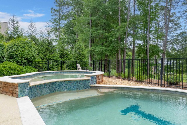 1051 Swift Crk, Greensboro, GA 30642 - view of swimming pool featuring a pool with connected hot tub