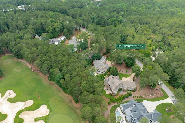 1051 Swift Crk, Greensboro, GA 30642 - aerial view of property and surrounding area featuring a heavily wooded area and a golf course