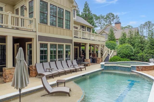 1051 Swift Crk, Greensboro, GA 30642 - view of pool featuring stairway, a patio, and a pool with connected hot tub